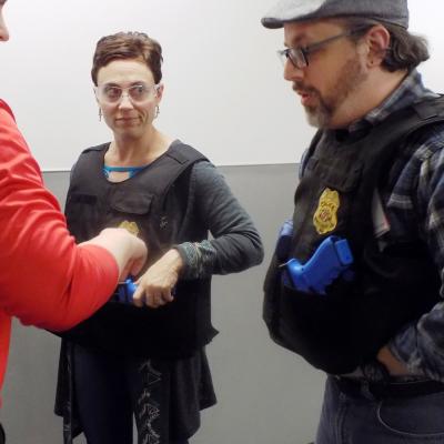 Debbie and her classmate, preparing for the MCPD ride-along 